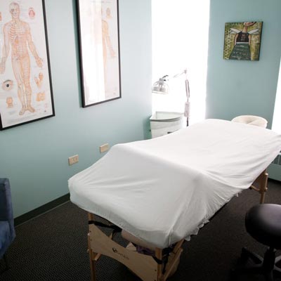 Office of Acupuncture Denver in Denver, CO with massage table.